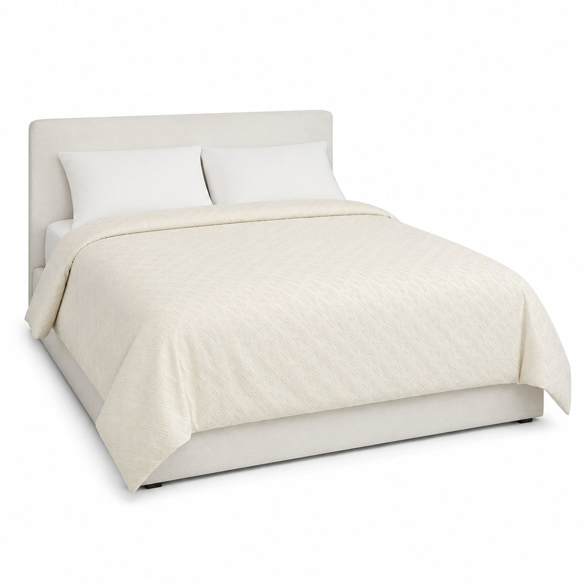 Primeval ivory tonal diamond texture duvet cover displayed on a styled bed against a clean white studio background
