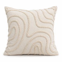 Ivory decorative cushion with raised tufted wave pattern