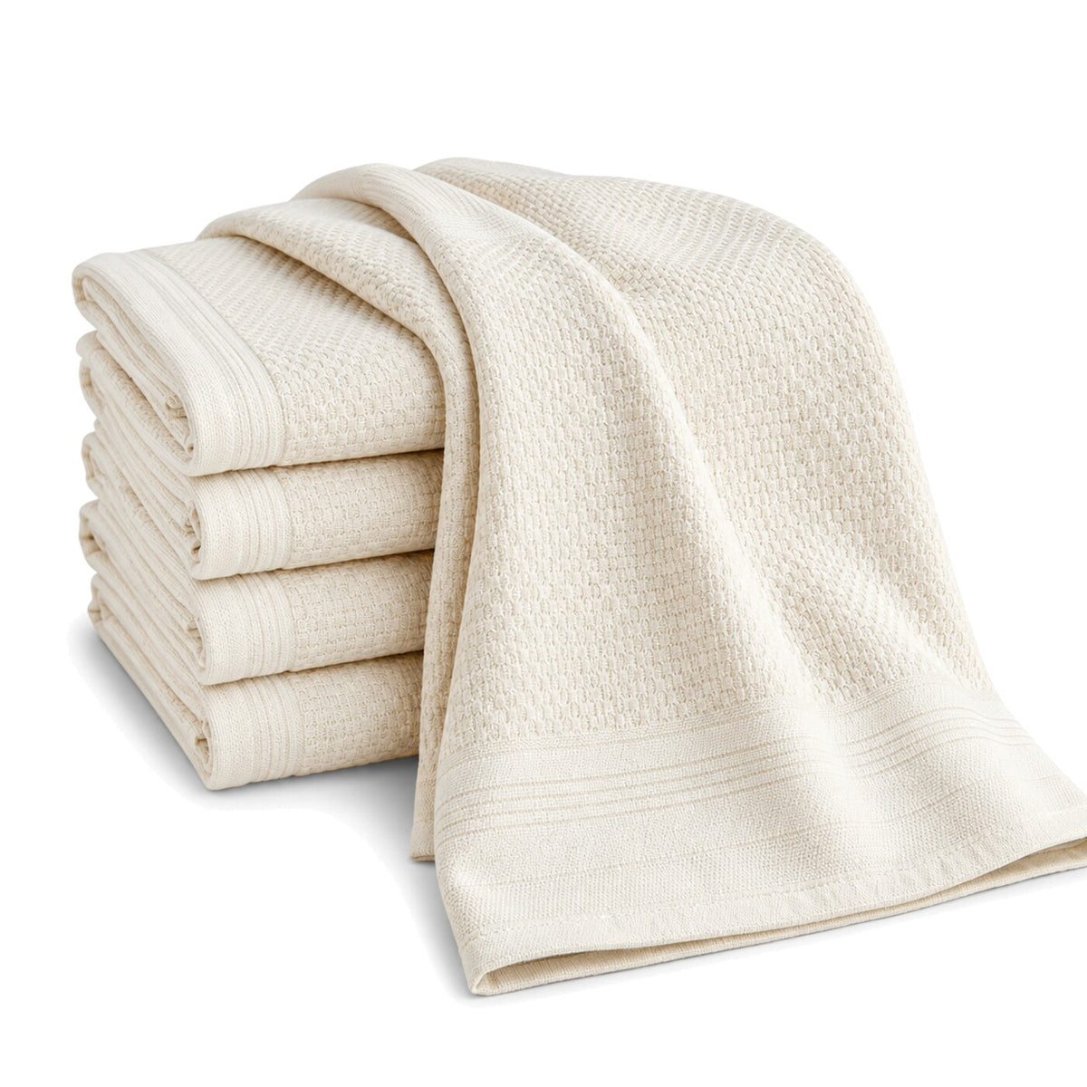 Primeval ivory waffle texture cotton kitchen towel set in folded studio presentation