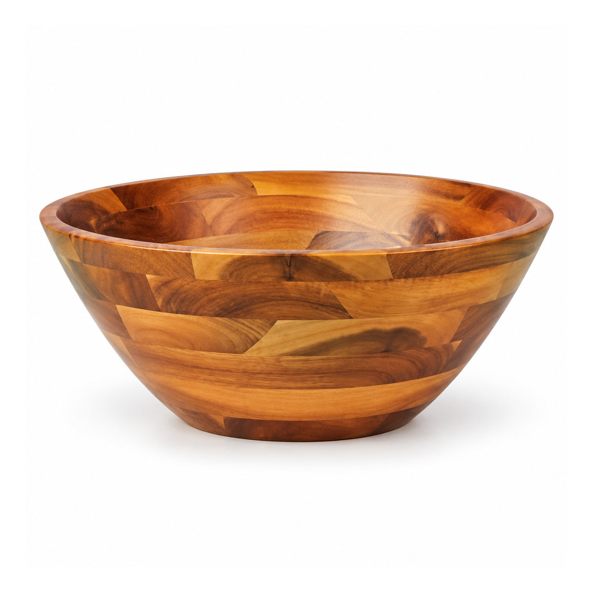 Large rounded wooden salad bowl with mixed dark and honey-brown patchwork grain and wide deep interior