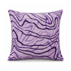 Primeval decorative throw cushion with lavender purple and violet flowing wavy contour lines