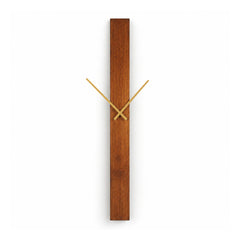 Minimalist vertical dark wooden wall clock with a tall narrow rectangular face and slim gold-tone clock hands