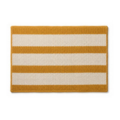 Mustard and cream woven striped bath mat on white background