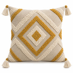 Mustard and ivory decorative cushion with tufted diamond pattern and corner tassels