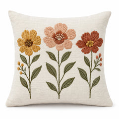 Ivory decorative cushion cover with mustard rust and terracotta flowers and green stems