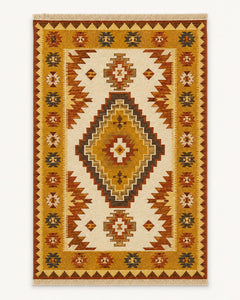 Mustard terracotta cream and brown medallion kilim rug with fringe for warm modern rug collections