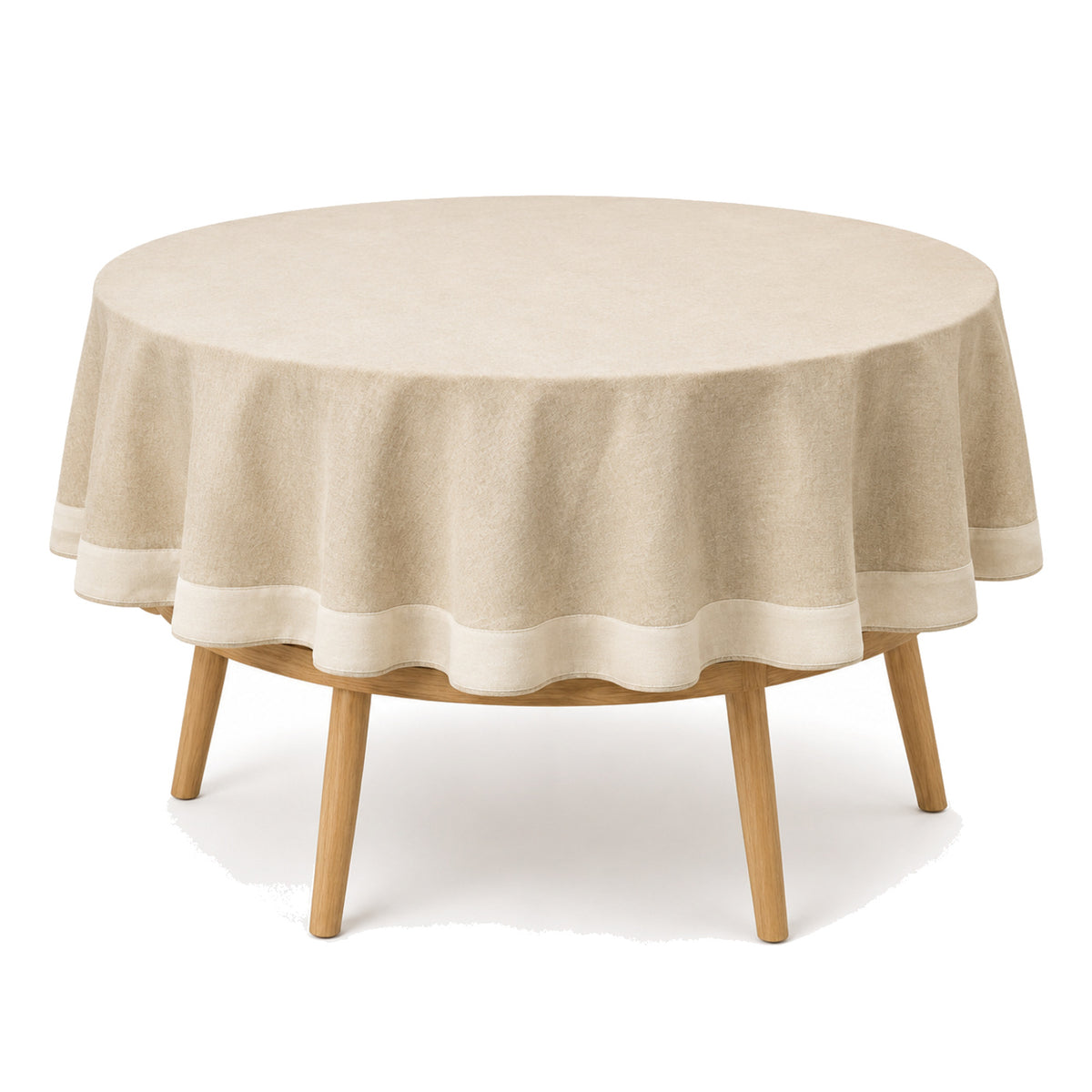 Primeval natural beige cream border tablecloth displayed on a round dining table