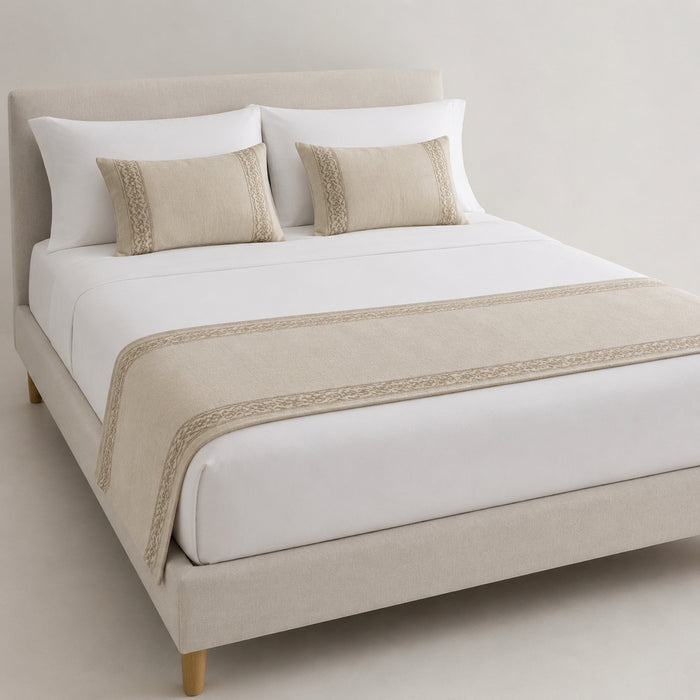Natural beige minimalist border bed runner styled on white bedding for wholesale hotel, hospitality and private-label sourcing