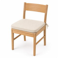 Primeval natural beige piped dining chair pad with tie straps on wooden dining chair