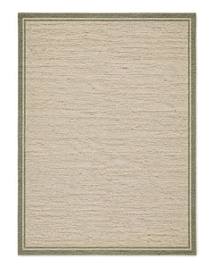 Natural beige handwoven area rug with a slim sage green border on a white background.