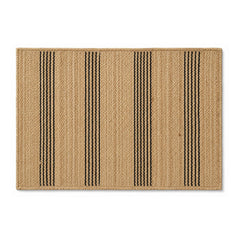 Natural beige woven bath mat with black vertical stripes on white background