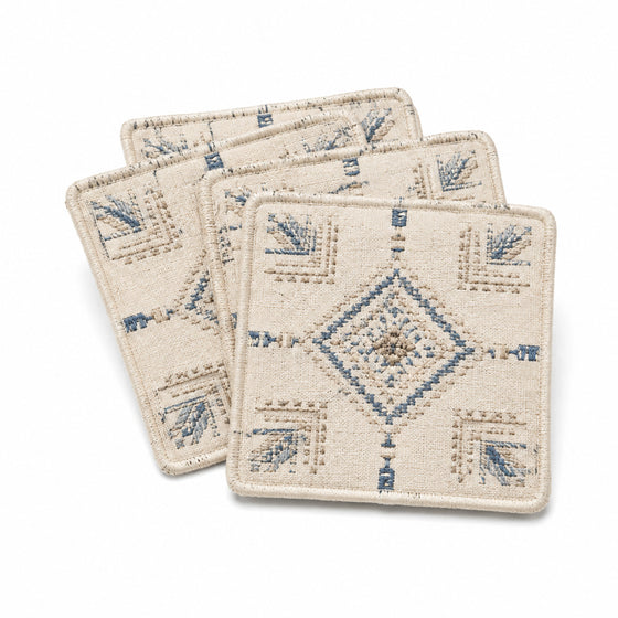 Natural blue beige geometric coaster set on a clean white background
