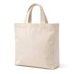 Natural boxy canvas tote bag with a structured rectangular body and short carry handles on a white background.