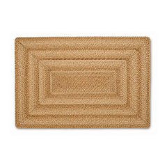 Natural braided jute rectangular bath mat with concentric border on white background