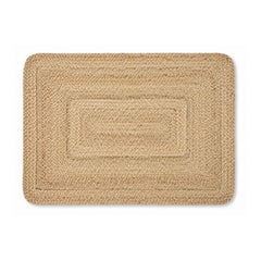 Natural braided jute concentric rectangular bath mat on white background