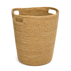 Primeval natural braided jute laundry basket with integrated handles on a white background