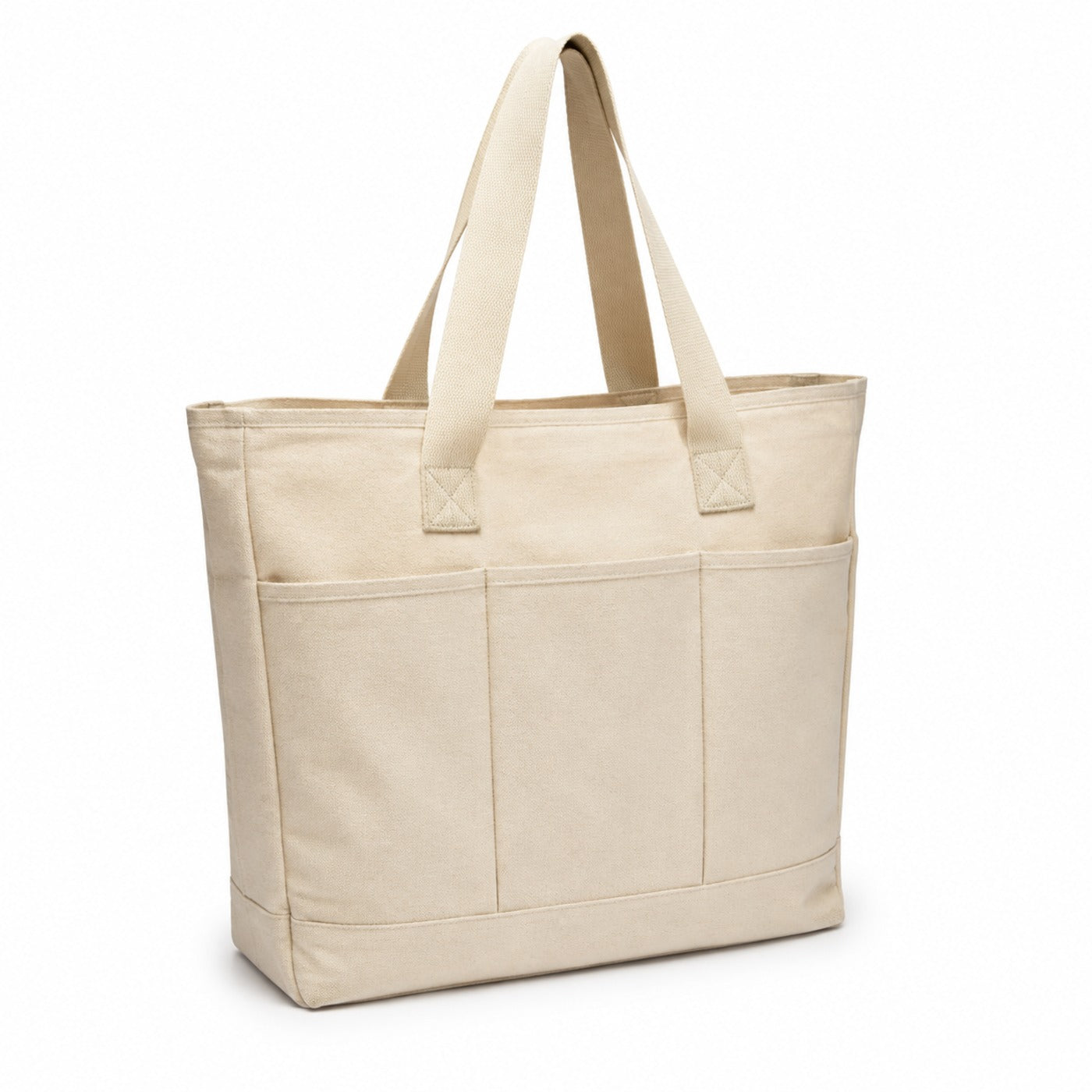 Natural canvas tote bag with divided front utility pockets and long handles on a white background.