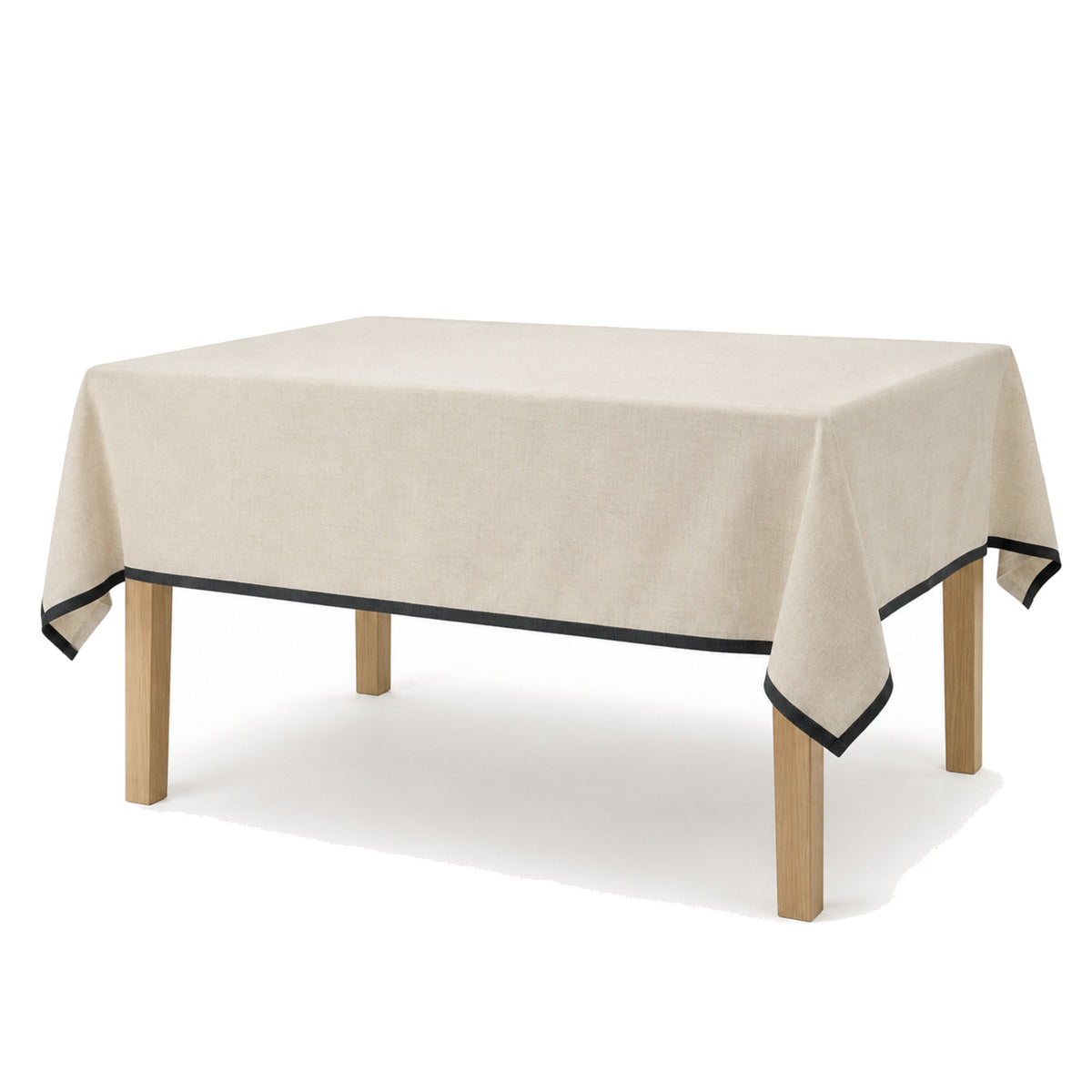 Primeval natural cotton black edge tablecloth displayed on a rectangular dining table