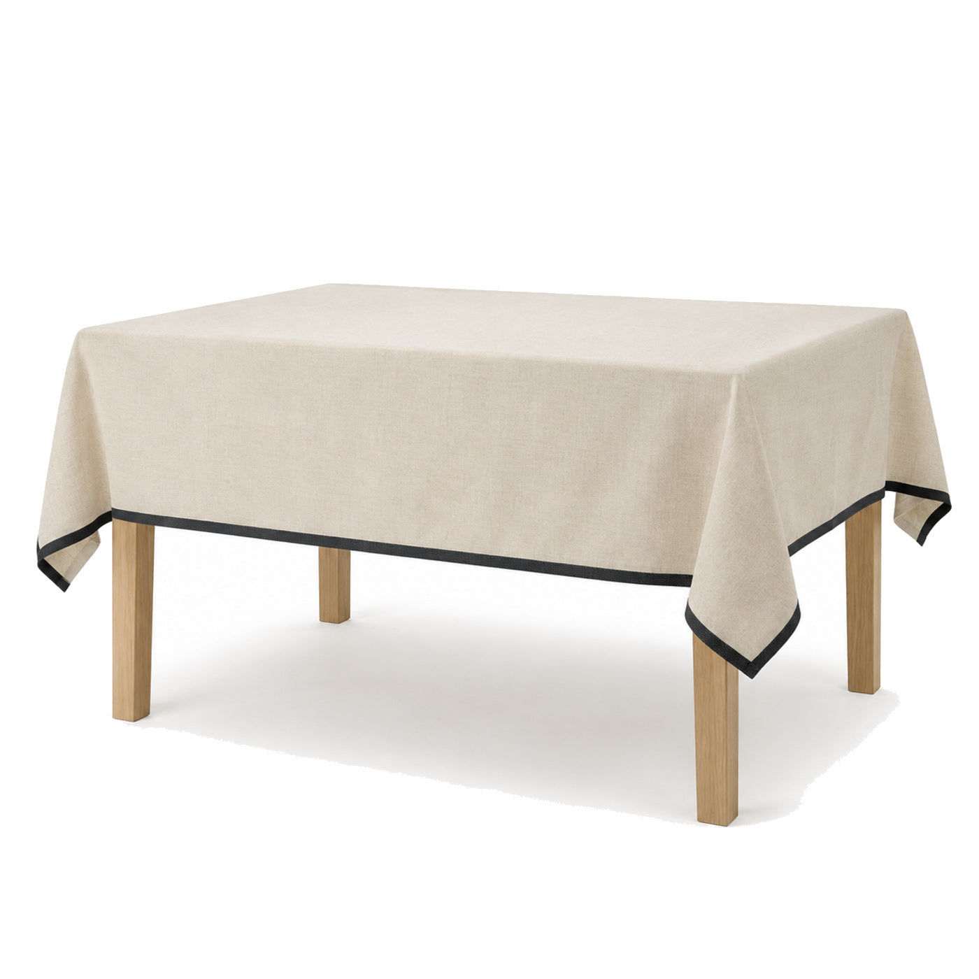 Primeval natural cotton black edge tablecloth displayed on a rectangular dining table