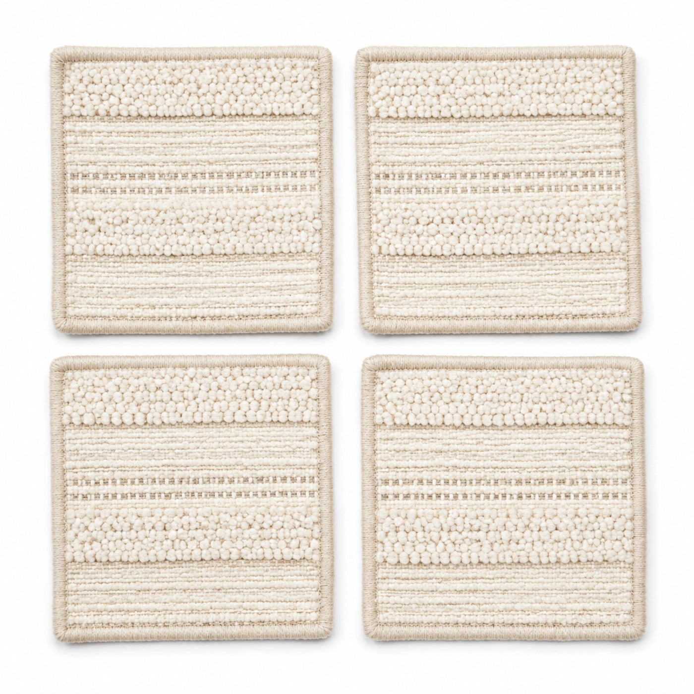 Natural cream textured band coaster set on a clean white background