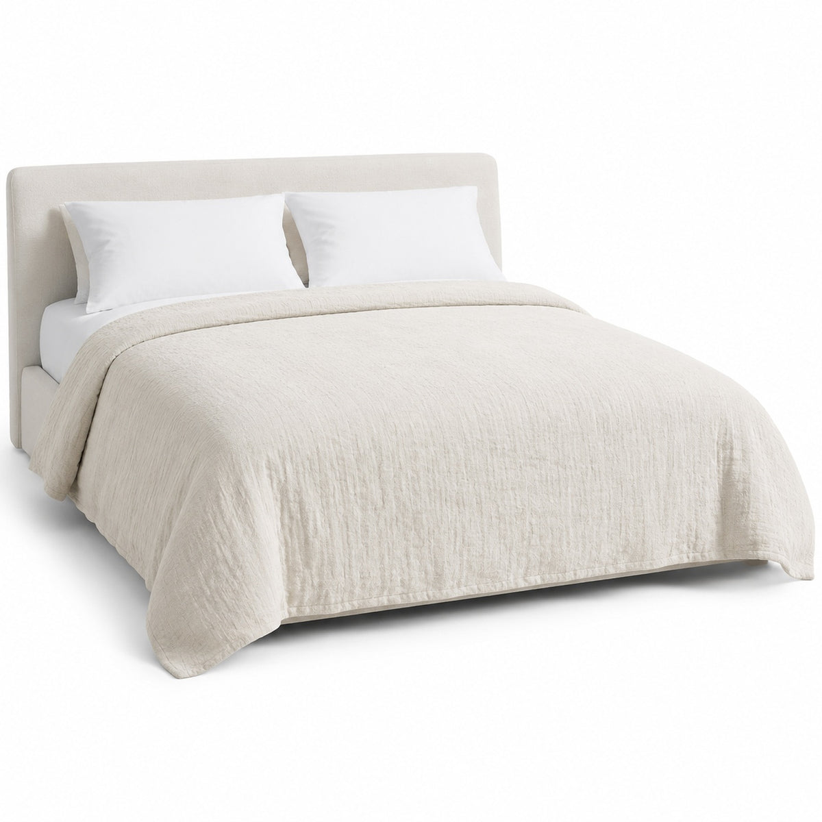 Primeval natural crinkled texture duvet cover displayed on a styled bed against a clean white studio background