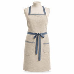 Primeval natural chef apron with dusty blue straps and pocket details displayed on a dress form