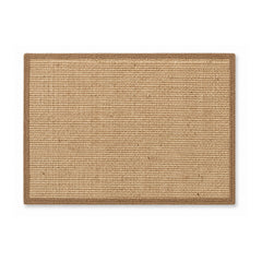 Natural jute woven bath mat with darker border on white background