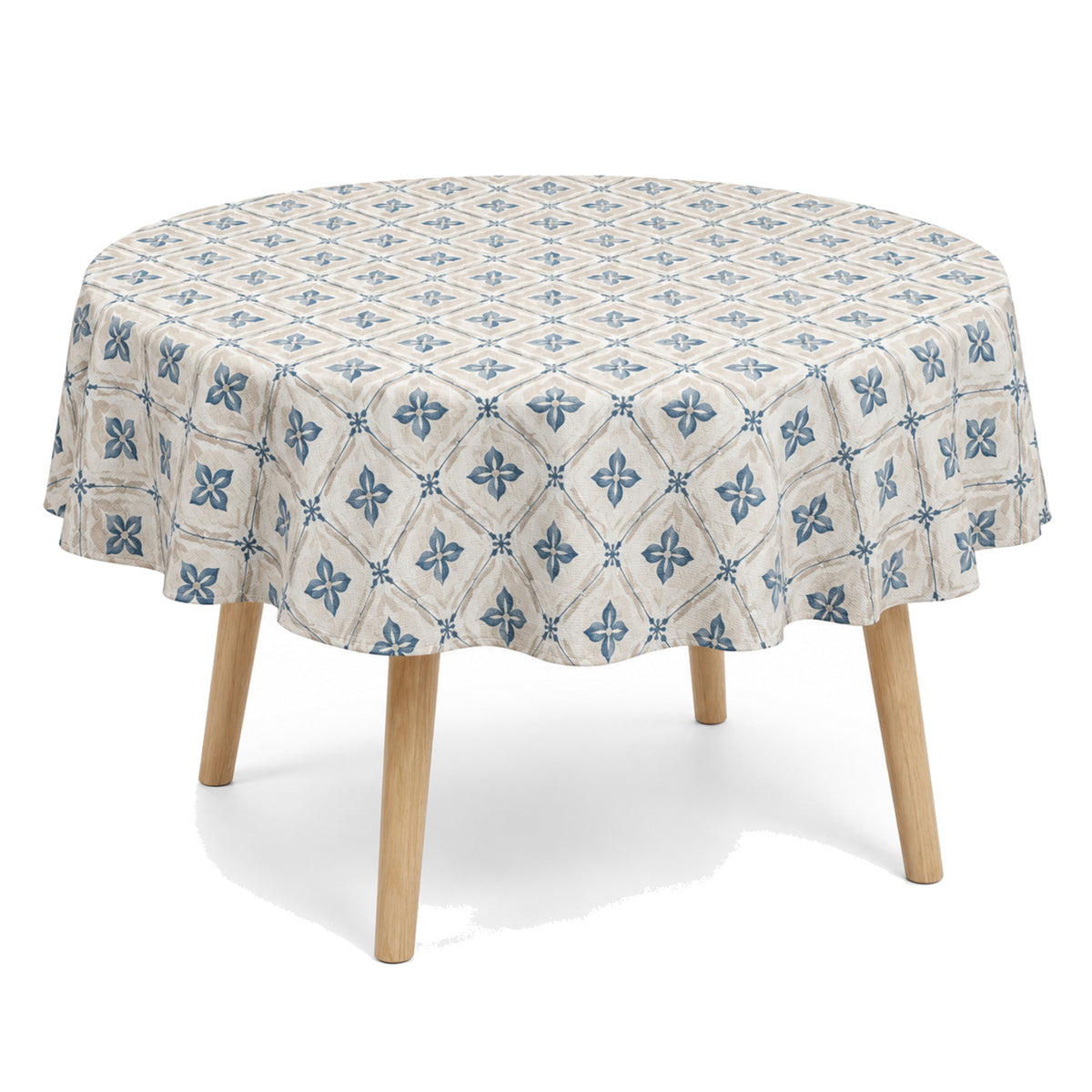 Primeval natural muted blue beige floral geometric tablecloth displayed on a round dining table