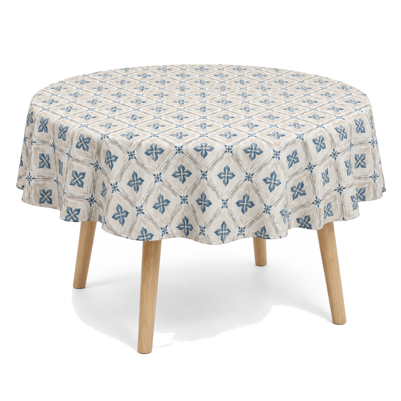 Primeval natural muted blue beige floral geometric tablecloth displayed on a round dining table