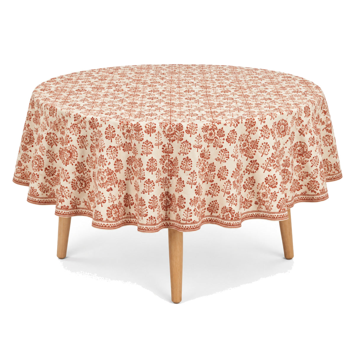 Primeval natural rust cream block motif tablecloth displayed on a round dining table