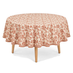 Primeval natural rust cream block motif tablecloth displayed on a round dining table
