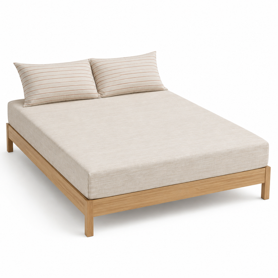 Natural slub bed sheet set with taupe striped matching pillowcases on a wooden bed