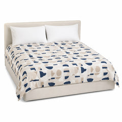 Primeval navy beige white minimalist geometric duvet cover displayed on a styled bed against a clean white studio background