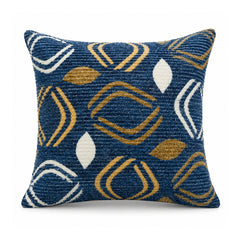 Primeval navy blue decorative throw cushion with mustard yellow and white abstract geometric shapes on a white background