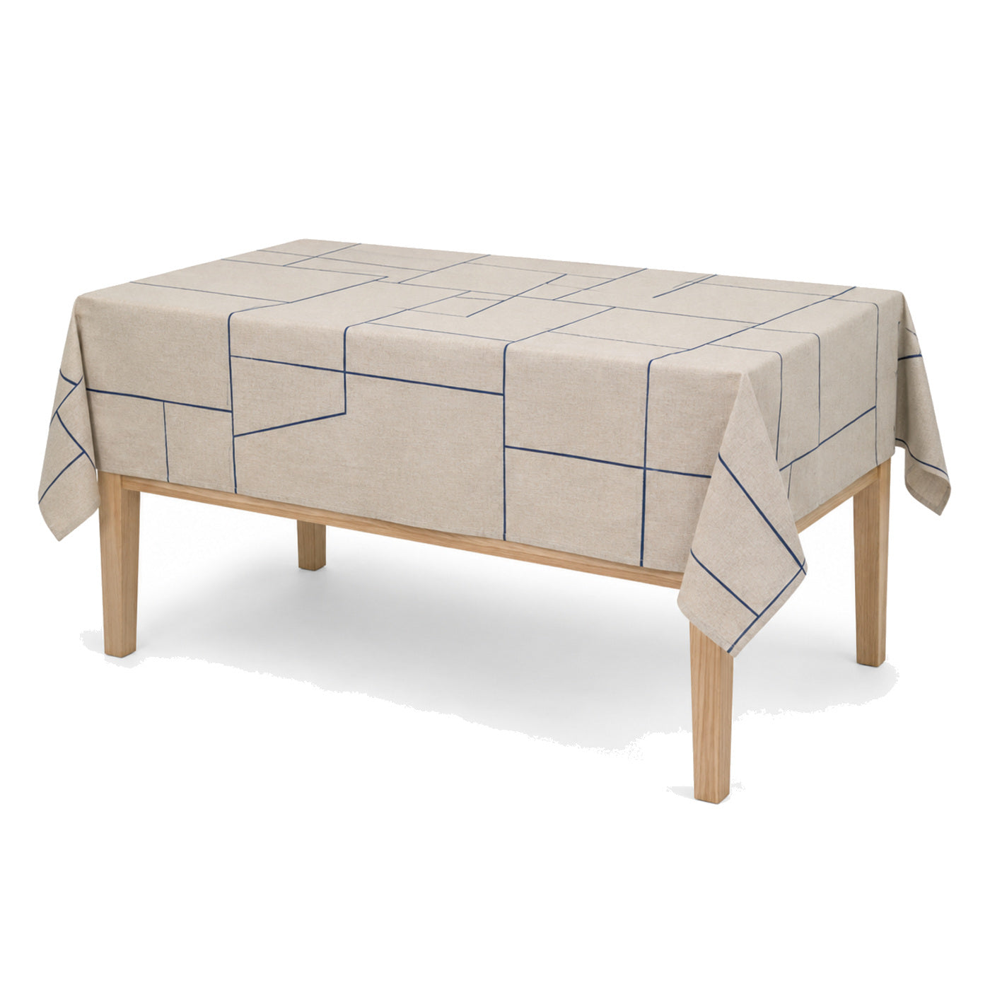 Primeval navy natural beige geometric tablecloth displayed on a rectangular dining table