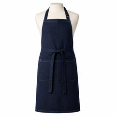 Primeval navy chef apron with tan contrast stitching and utility pockets displayed on a dress form