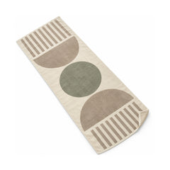 Neutral modern beach towel with a clean circle-based geometric pattern.