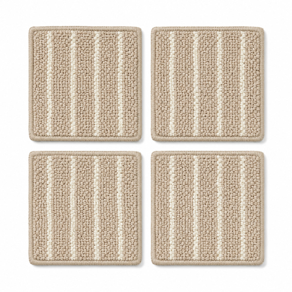Oatmeal ivory loop stripe coaster set on a clean white background