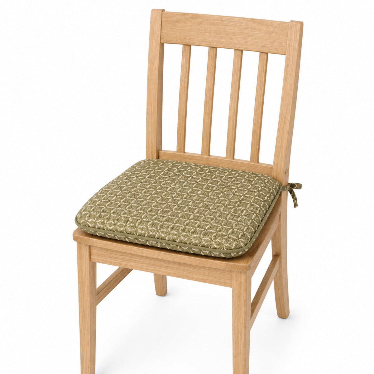 Primeval olive geometric woven dining chair pad with tie straps on wooden dining chair