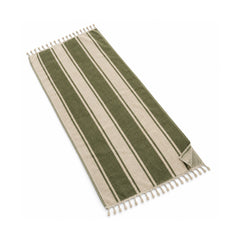 Olive green and natural striped fringed beach towel on a white background.
