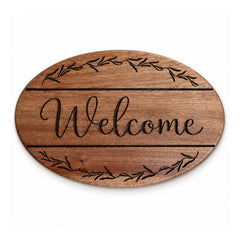 Oval warm brown wooden welcome plaque with dark engraved Welcome lettering and decorative leafy branches