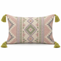 Pastel lumbar cushion cover with kilim-inspired geometric pattern and corner tassels