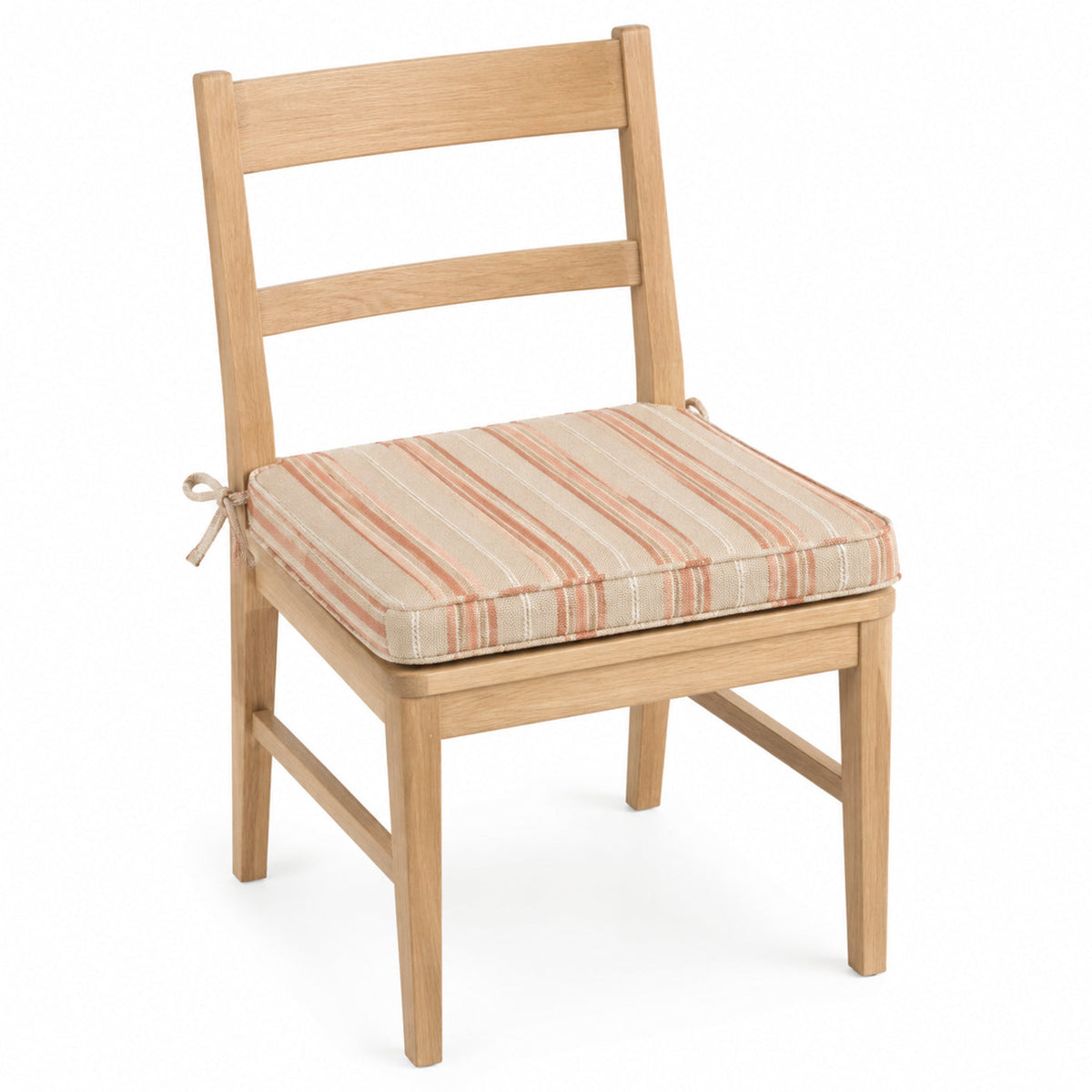 Primeval peach and terracotta striped dining chair pad with tie straps on wooden dining chair