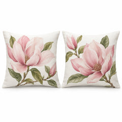 Pair of ivory decorative cushions with soft pink magnolia floral print