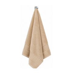 Plush beige towel for neutral bathroom, spa and hospitality collections