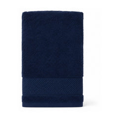Plush navy towel with woven border for premium bathroom and hotel collections