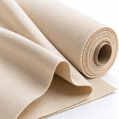 Natural beige cotton canvas fabric roll with coarse plain-weave texture and draped folds, fabric sourcing reference PML-FAB-001