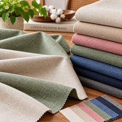 Cotton polyester blended fabric reference in sage green and neutral folded swatches; Primeval fabric sourcing reference PML-FAB-016