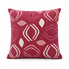 Primeval raspberry pink and ivory decorative cushion cover with repeated stylized pointed leaf and elongated diamond motifs