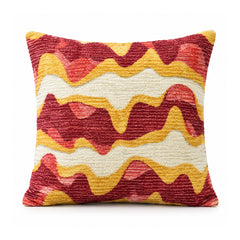 Primeval red orange and mustard yellow cushion featuring wide flowing retro abstract wave stripes